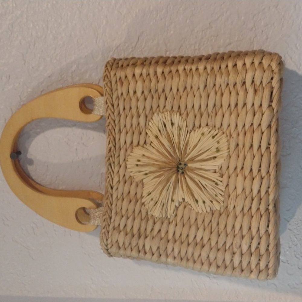 This is a small tan basket weave style Faded Glory mini tote bag